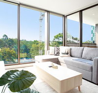 Designer Apartment with Balcony in Quiet Suburb - eTourism Australia