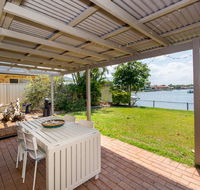 Lowset home on the canal - Dolphin Dr Bongaree - eTourism Australia