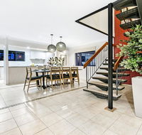 7 Bedroom Gold Coast Luxury Waterfront Home with Pool sleeps 20 - eTourism Australia